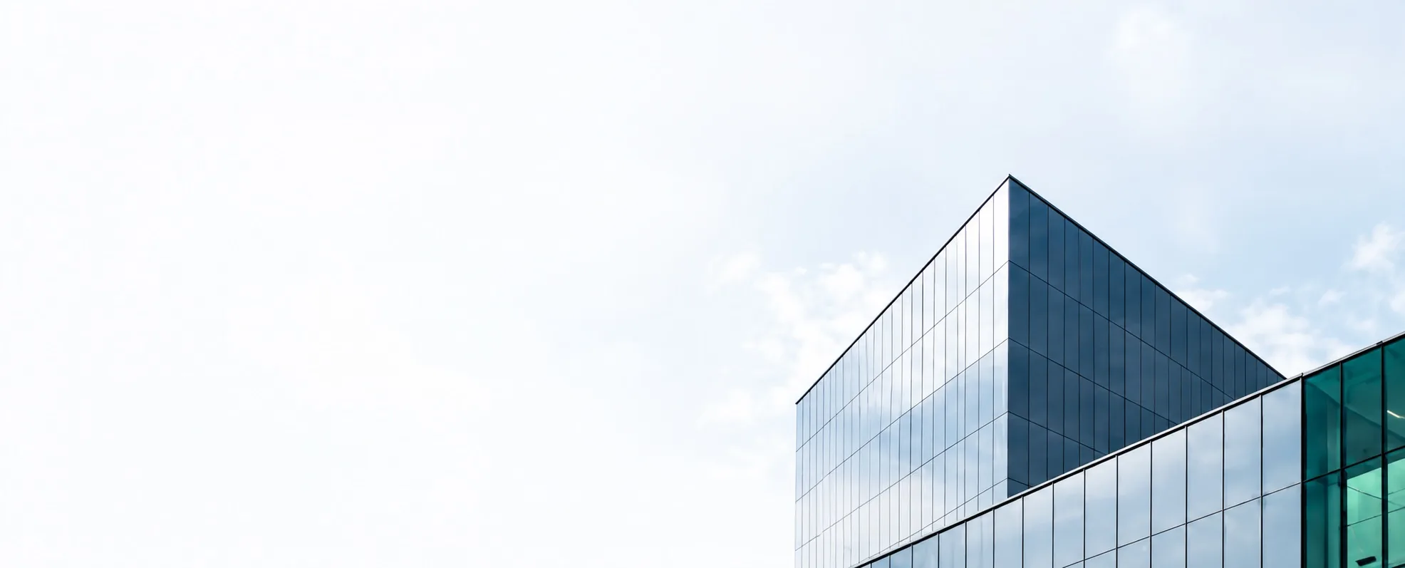 Glass office tower representing TravelBookingPanel, a travel booking panel and online travel booking system